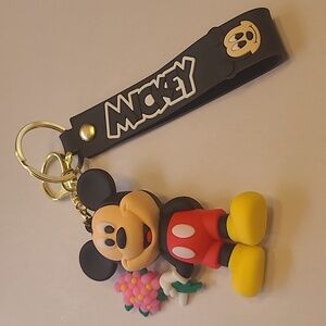 NWOT Mickey Mouse Keychain with Red and Yellow Accents on a black wrist Strap.